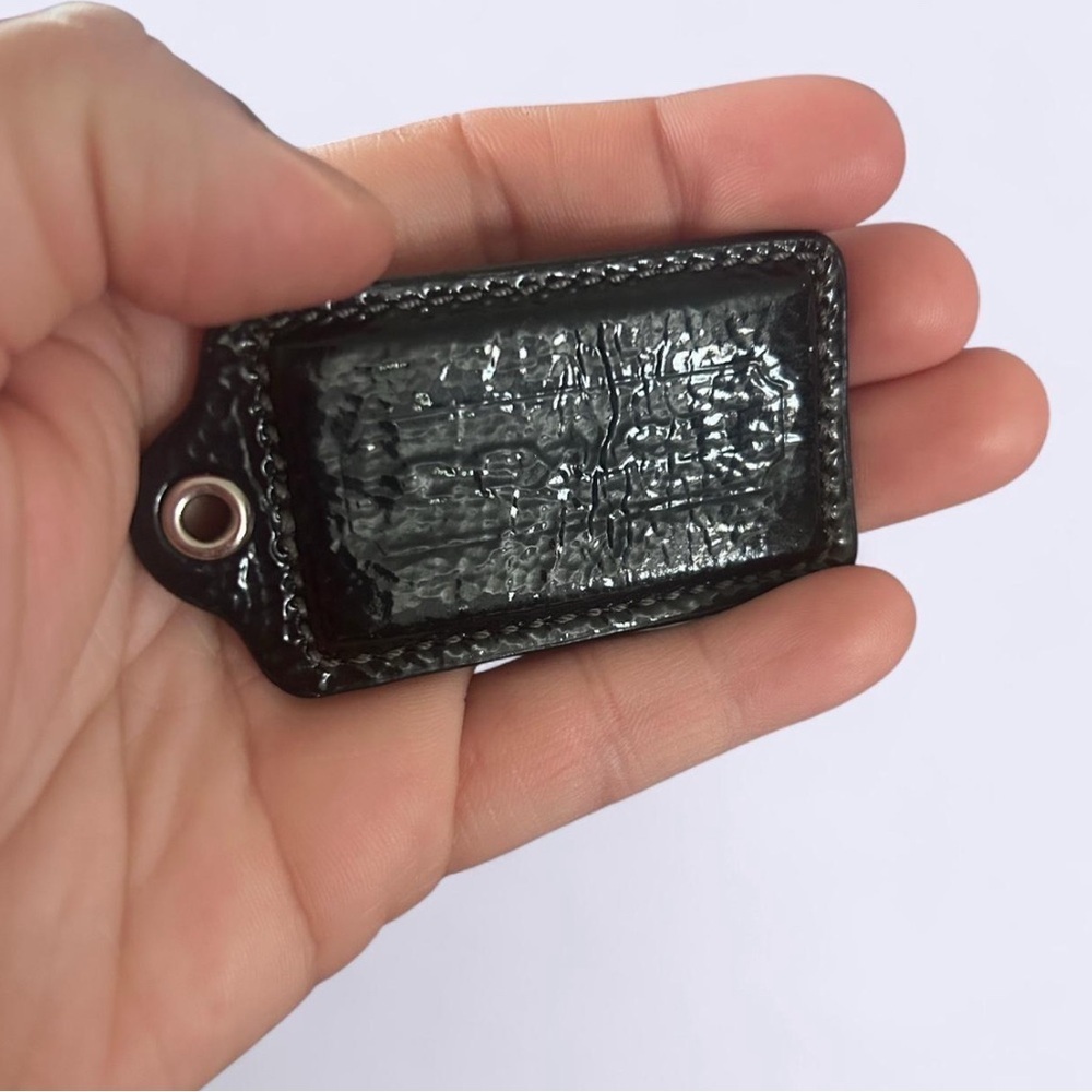 Black Bag Coach Tag